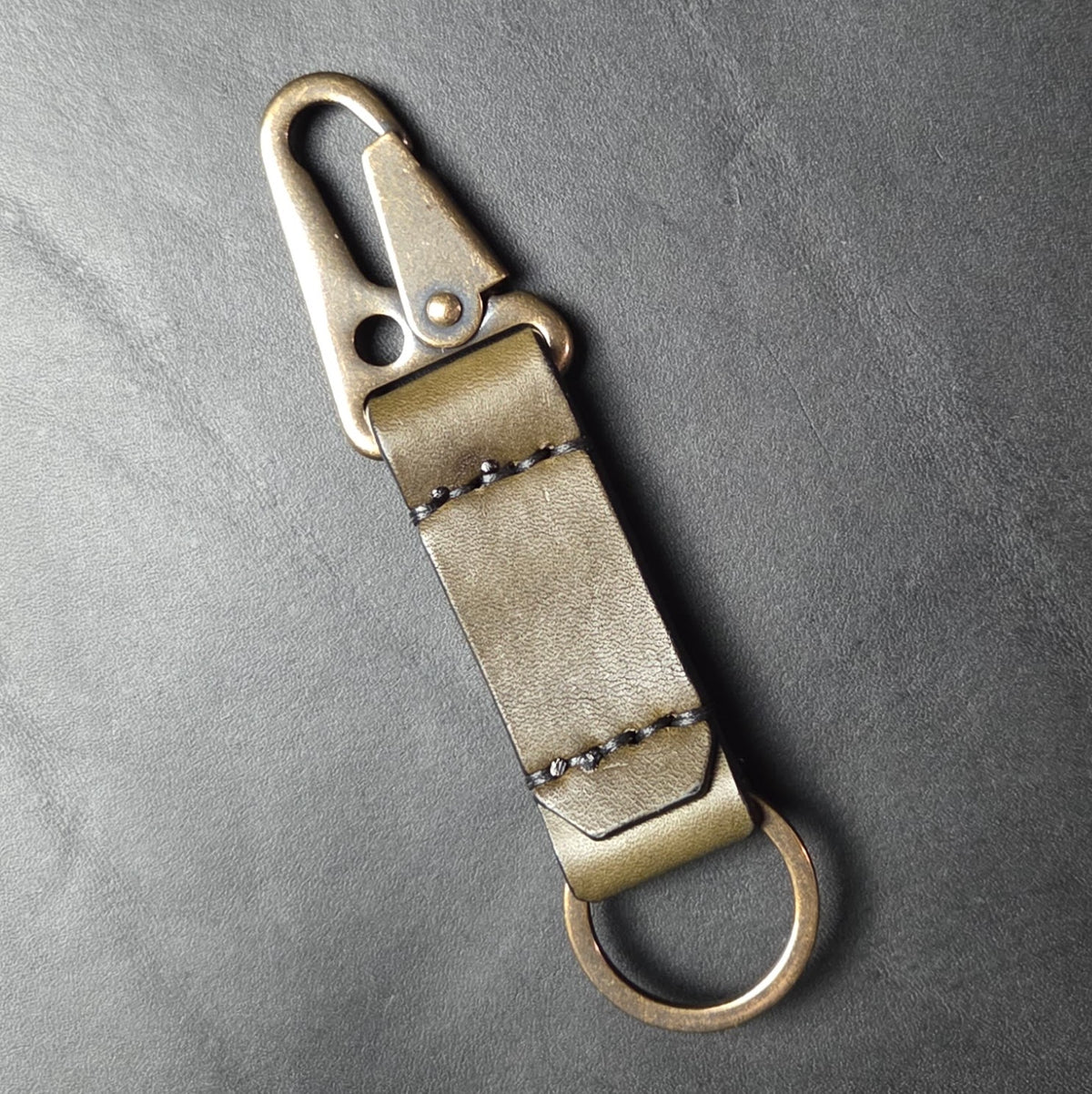12 GAUGE LEATHER KEYCHAIN.
